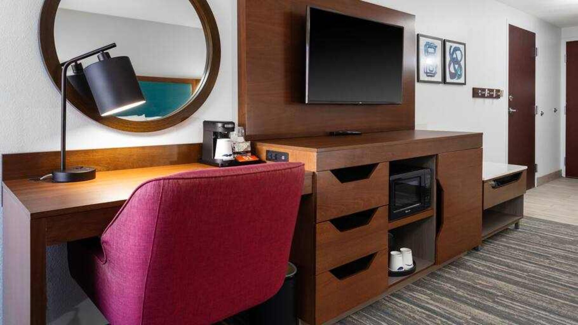 Working station in a hotel room at the Hampton Inn Concord Bow.