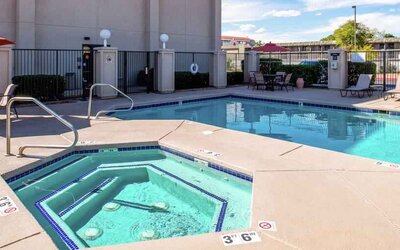 Beautiful outdoor area with two pools at the Hampton Inn Albuquerque, University-Midtown (UNM).