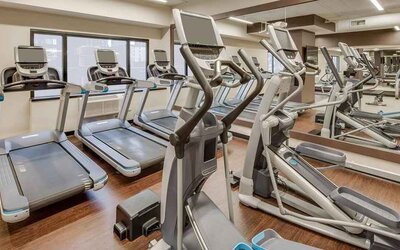 fully equipped fitness center at DoubleTree by Hilton Hotel & Suites Jersey City.
