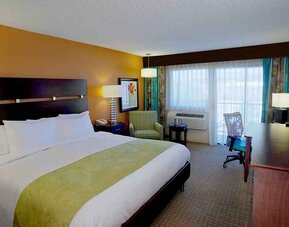 pretty king room with work desk ideal for working remotely at DoubleTree by Hilton Hotel Santa Fe.