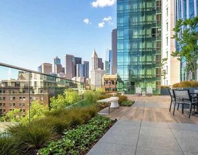 lovely outdoor patio with city scape views at Embassy Suites by Hilton Seattle Downtown Pioneer Square.