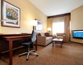 Working station in a hotel room at the DoubleTree Suites by Hilton Cincinnati-Blue Ash.