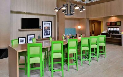 Lobby workspace perfect for co-working at the Hampton Inn & Suites St. Paul Oakdale/Woodbury by Hilton.