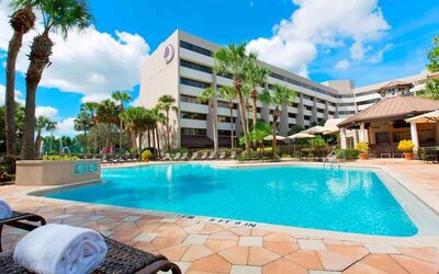 Relaxing outdoor pool at the DoubleTree Suites by Hilton Orlando - Disney Springs Area.