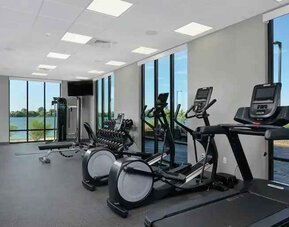 Bright fitness center with treadmills at the Hampton Inn Burley.
