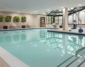 Spacious indoor pool with floral design at the Embassy Suites by Hilton Atlanta Alpharetta