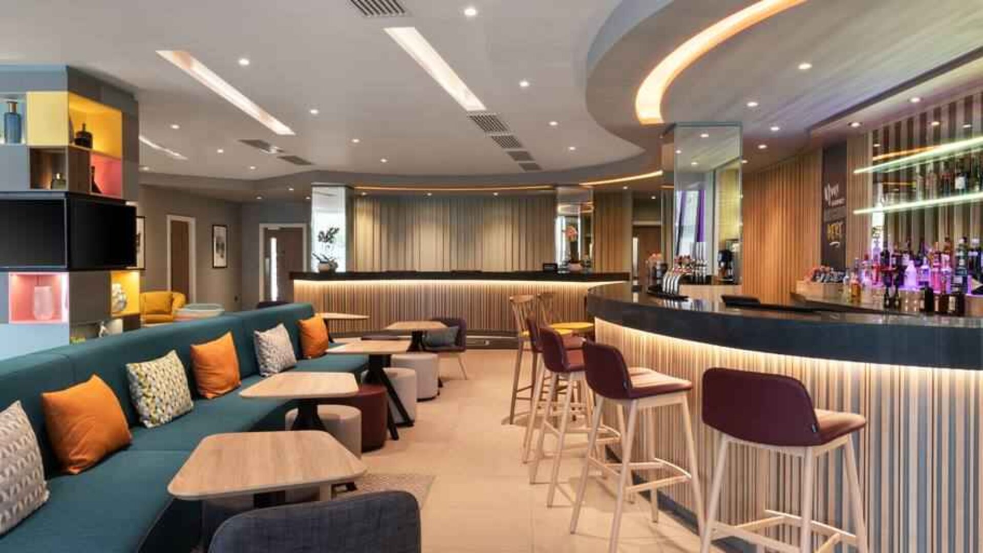 Hotel workspace along the bar at the Hampton by Hilton London Ealing.