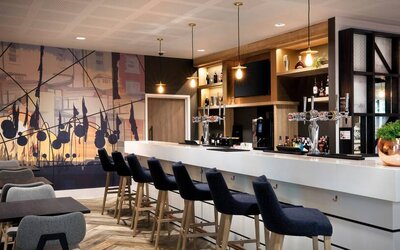 Hotel workspace along the bar at the Hampton by Hilton Bristol Airport.