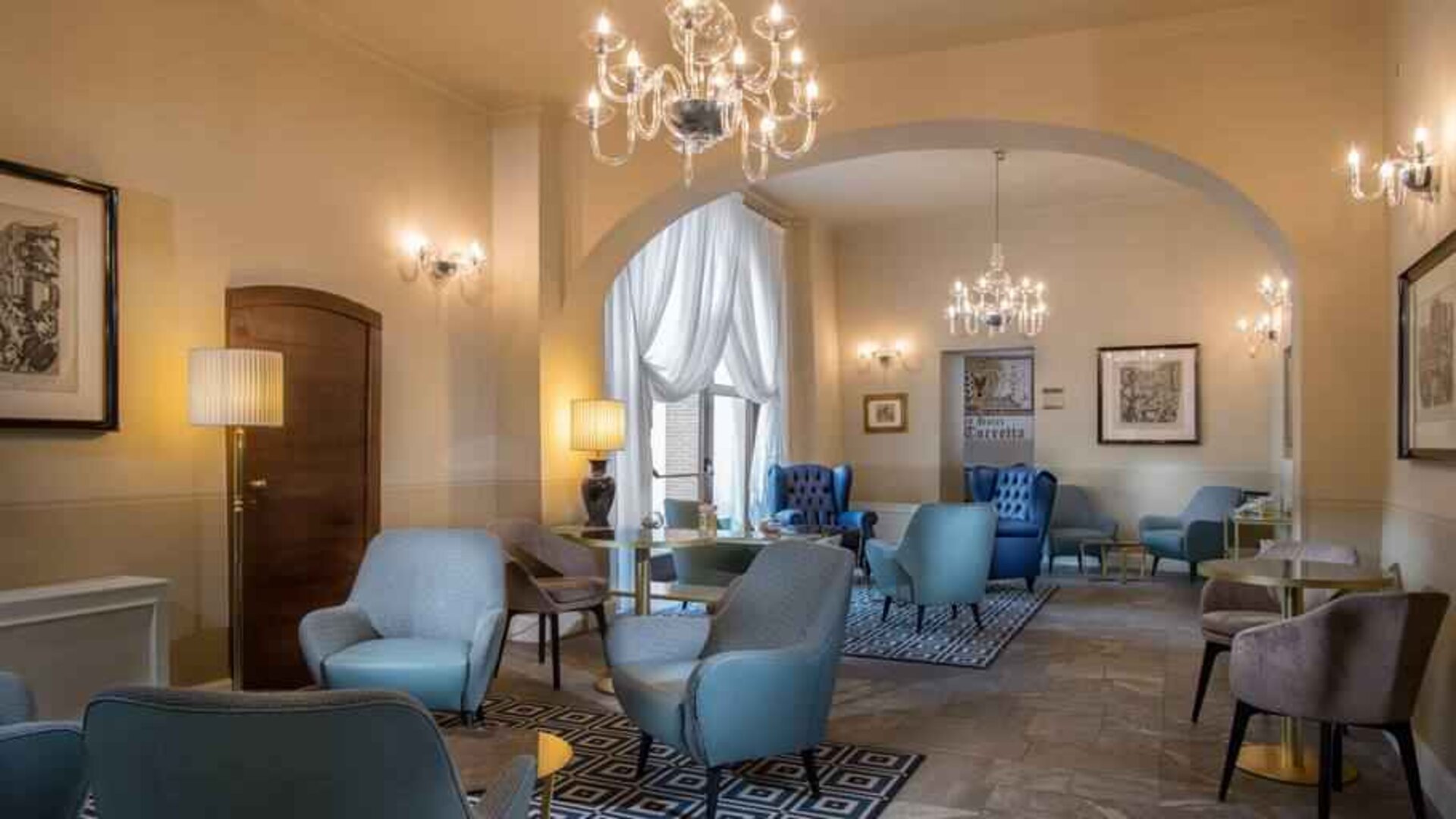 Stylish lobby workspace at the Grand Hotel Villa Torretta Milan Sesto, Curio Collection.