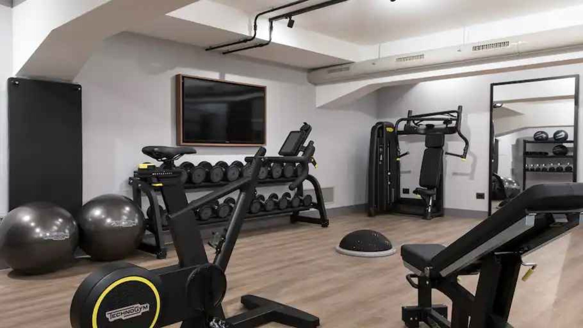 Fully equipped fitness center at the DoubleTree by Hilton Rome Monti.