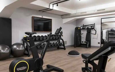 Fully equipped fitness center at the DoubleTree by Hilton Rome Monti.