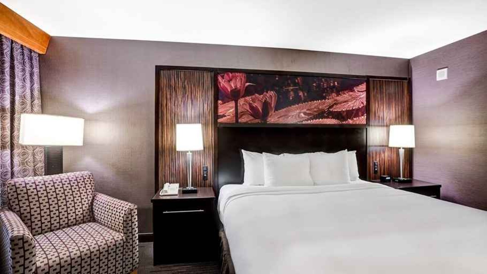 Beautiful king suite with lounge area at DoubleTree by Hilton Hotel Downtown Wilmington - Legal District.