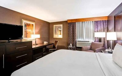 Spacious king room with TV and work desk at DoubleTree by Hilton Hotel Downtown Wilmington - Legal District.