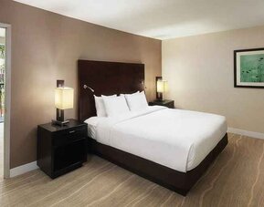 spacious king suite with dedicated work desk ideal for working remotely at DoubleTree by Hilton Hotel San Diego - Hotel Circle.