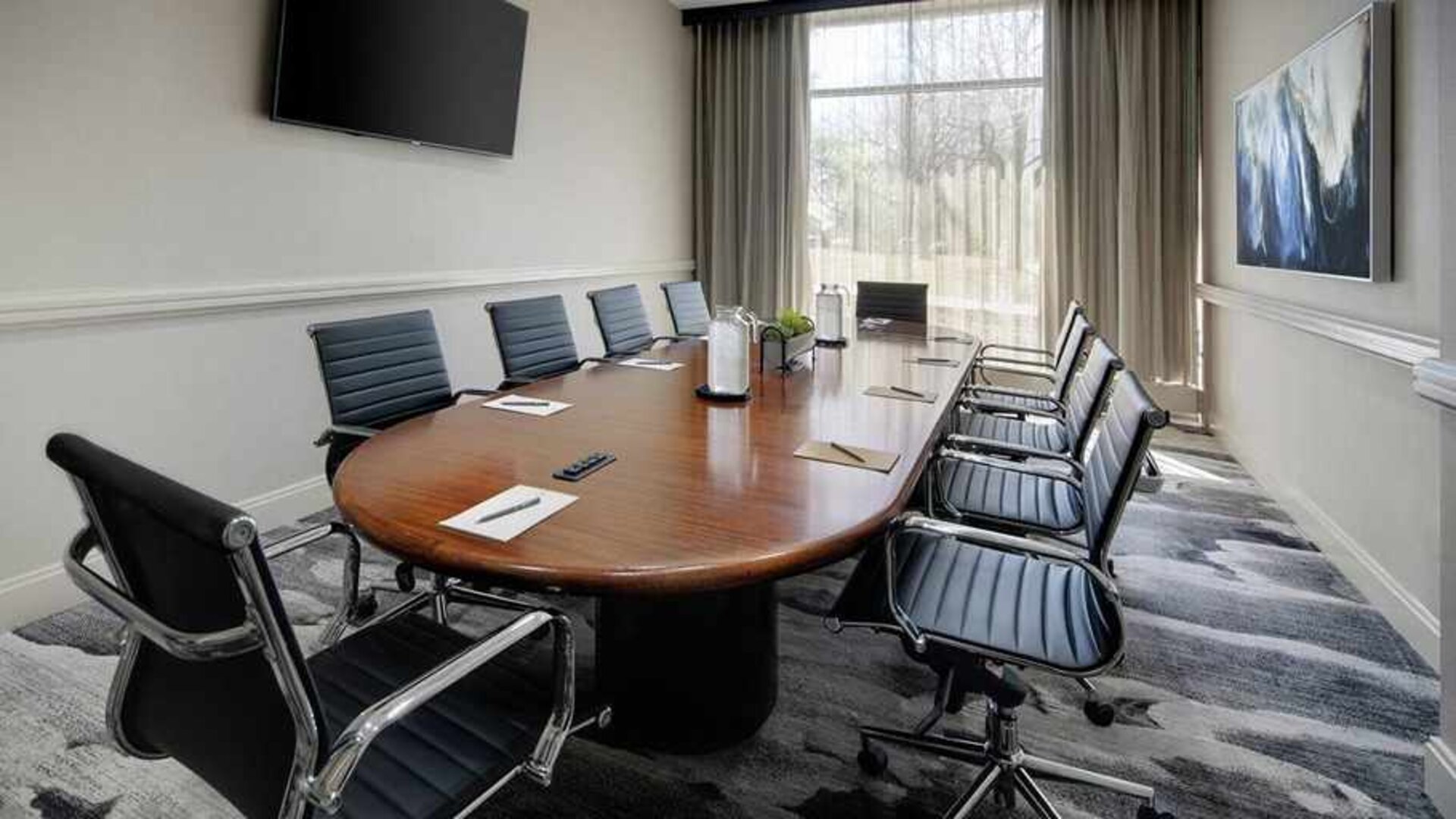 professional, bright-lit meeting room at Embassy Suites by Hilton Detroit Troy Auburn Hills.