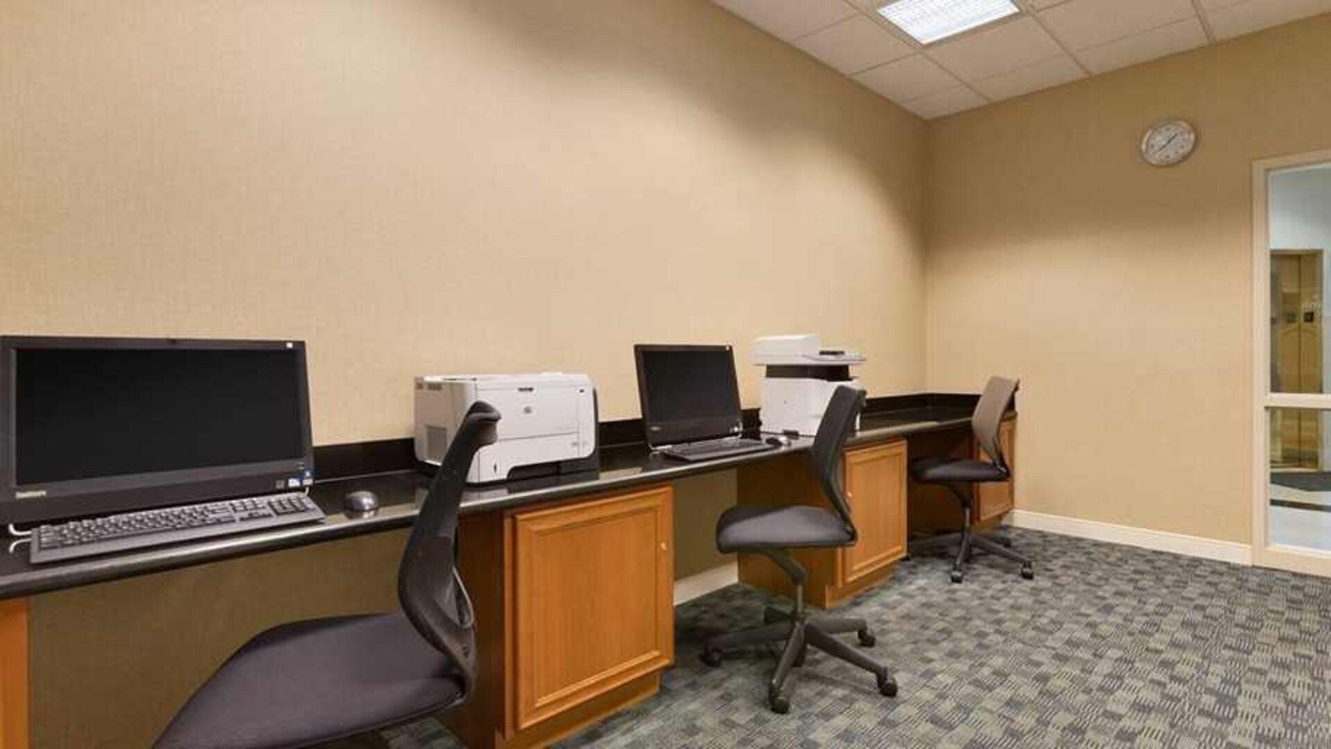 business center with work desk, PC, internet, and printer at Embassy Suites by Hilton Newark Wilmington South.