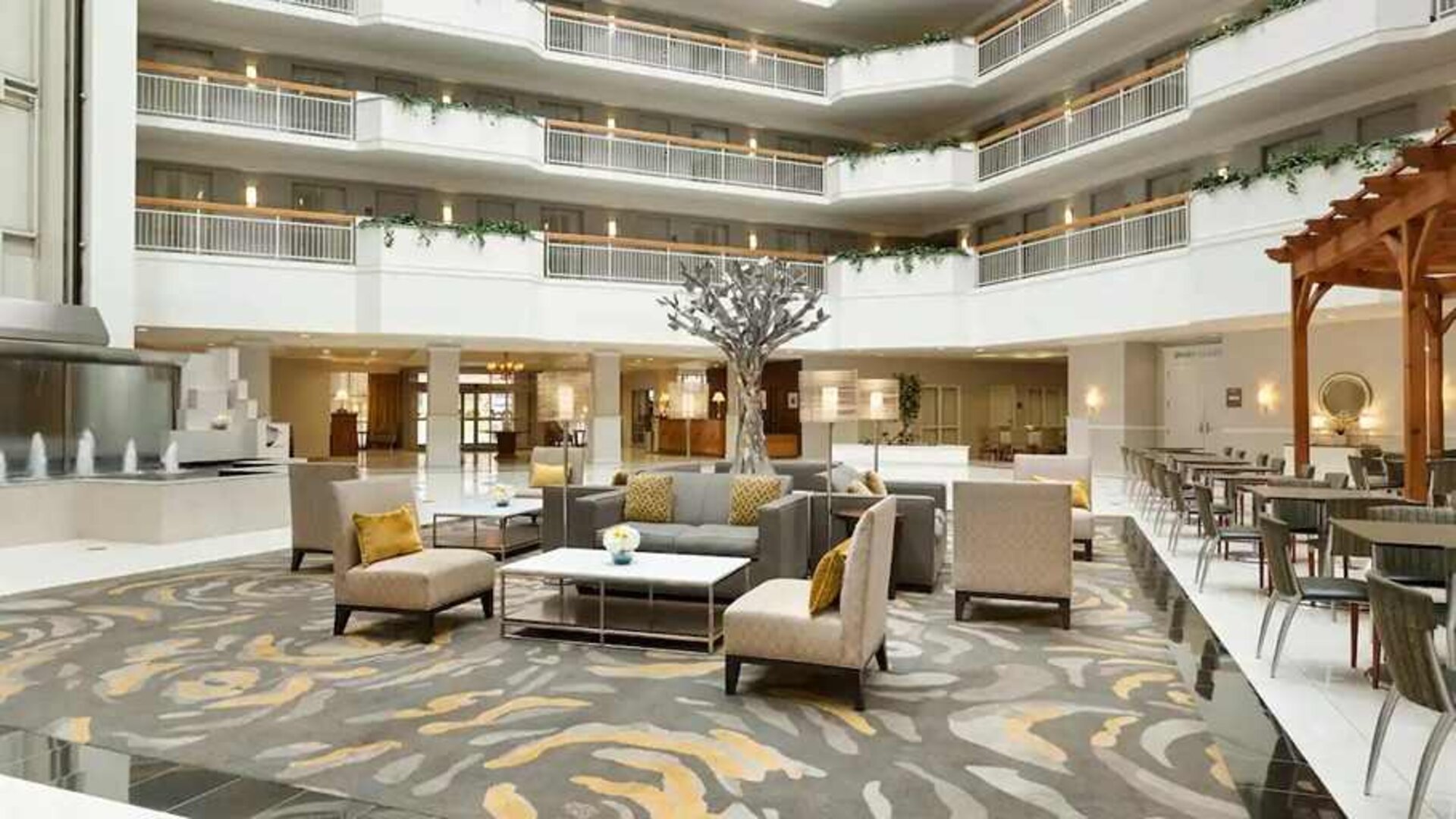 comfortable and spacious lounge and coworking space at Embassy Suites by Hilton Newark Wilmington South.