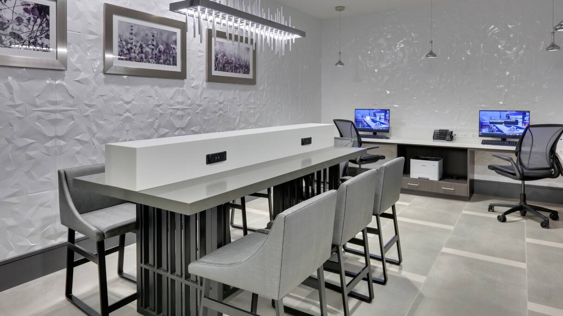 business center and coworking space equipped with work desks, PC, internet, and printers at Hampton Inn Irvine Spectrum Lake Forest.