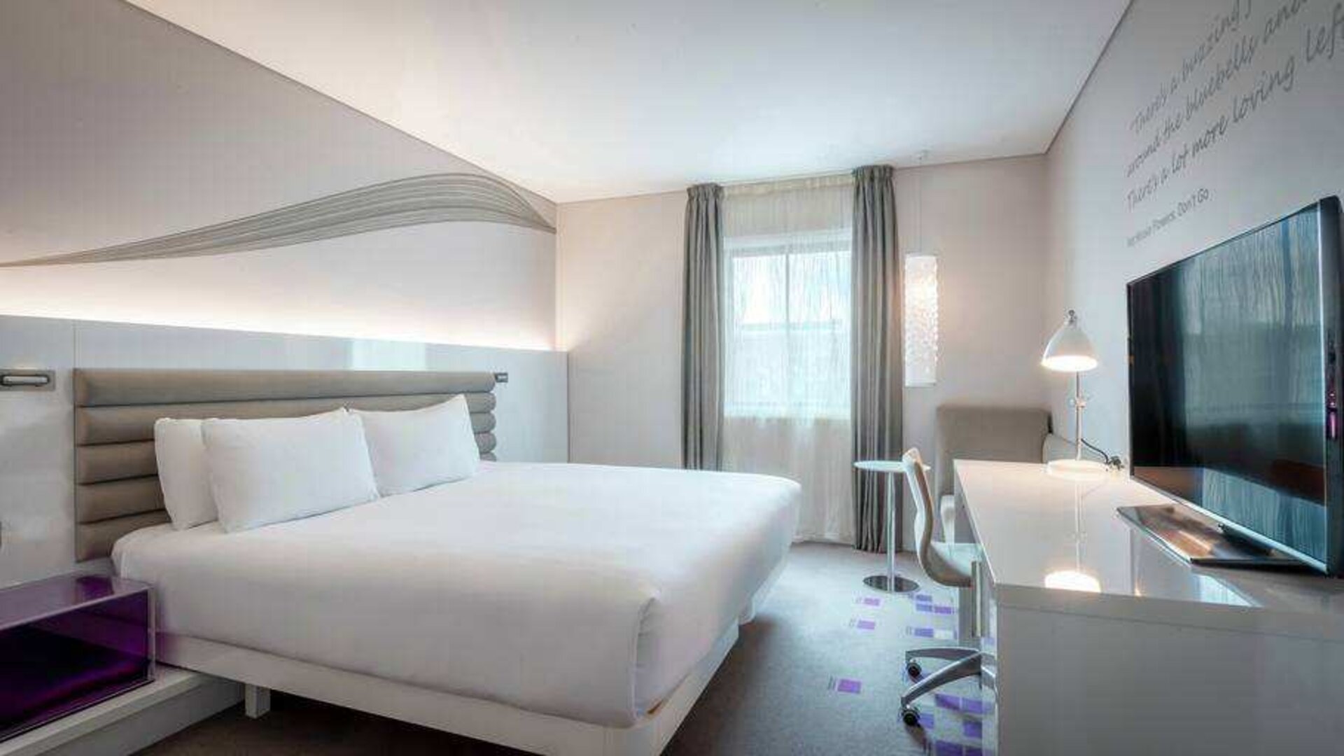 King guestroom with working station at the Morrison, a DoubleTree by Hilton Hotel.