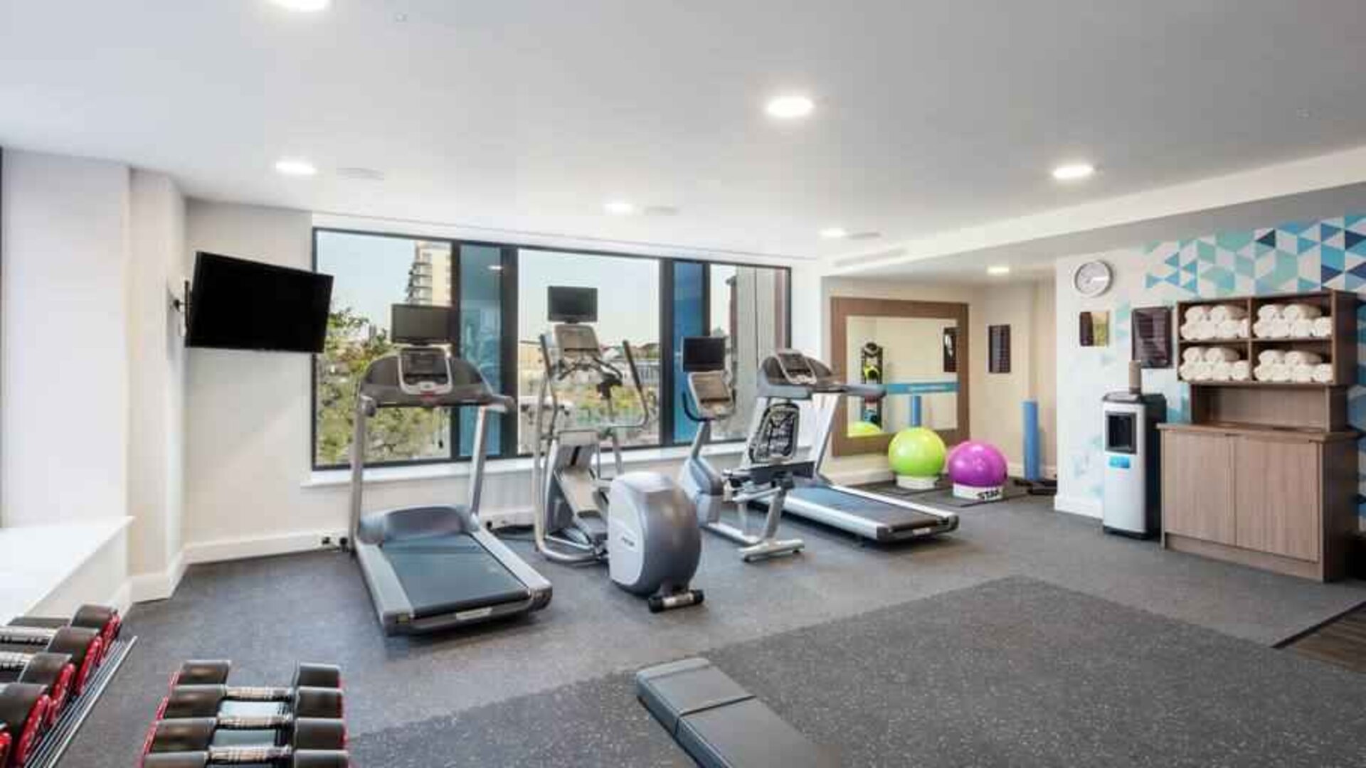 Fitness center with treadmills at the Hampton by Hilton Belfast City Centre.