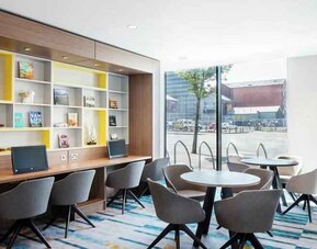 Working station with computers at the Hampton by Hilton Belfast City Centre.