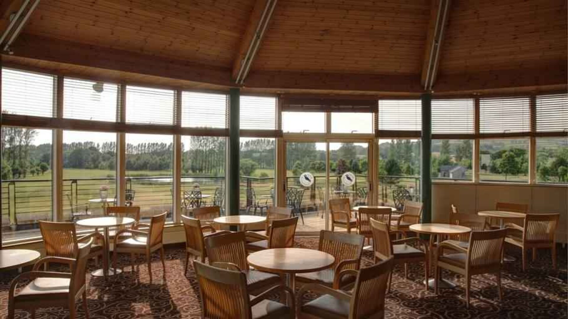 Restaurant area with view at the Hilton Belfast Templepatrick Golf & Country Club.
