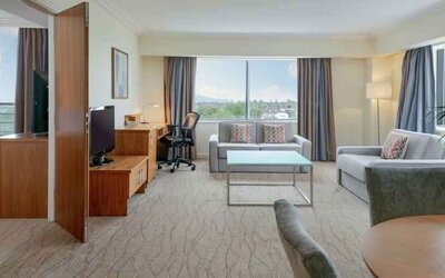 Comfortable living room in a hotel suite at the Hilton Dublin Airport.