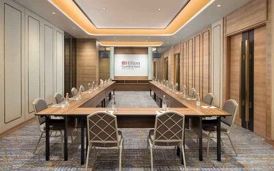 Elegant meeting room with u shape table at the Hilton Garden Inn Jakarta Taman Palem.