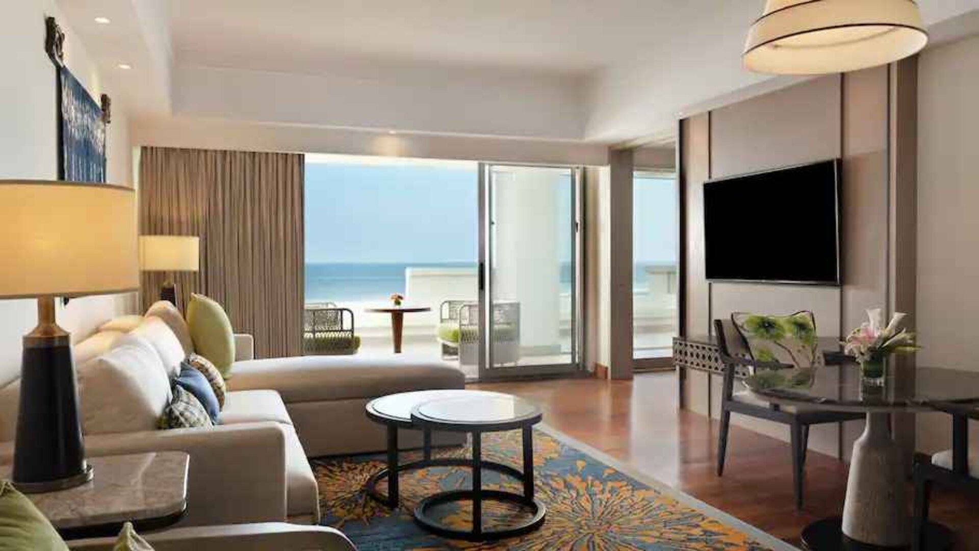 Comfortable living room with working station at the Hilton Bali Resort.