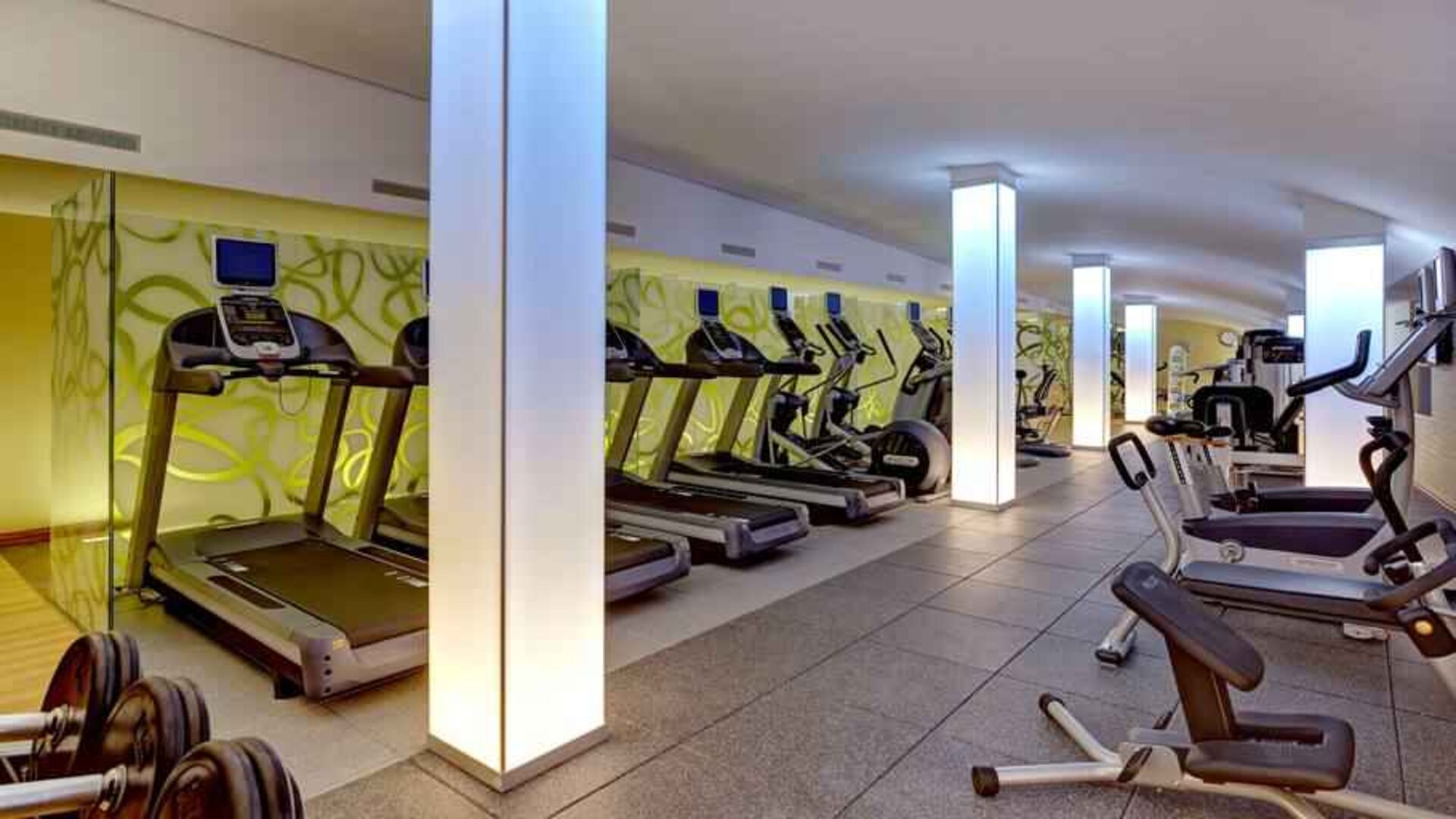 Fitness center with treadmills at the Hilton Frankfurt Airport.