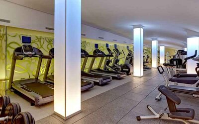 Fitness center with treadmills at the Hilton Frankfurt Airport.
