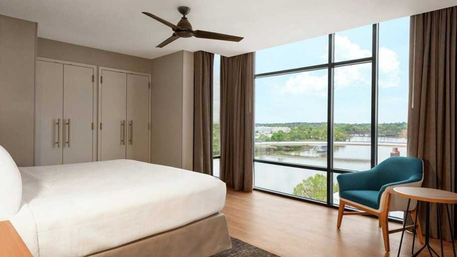 beautiful king room with water views at Homewood Suites by Hilton Wilmington Downtown.