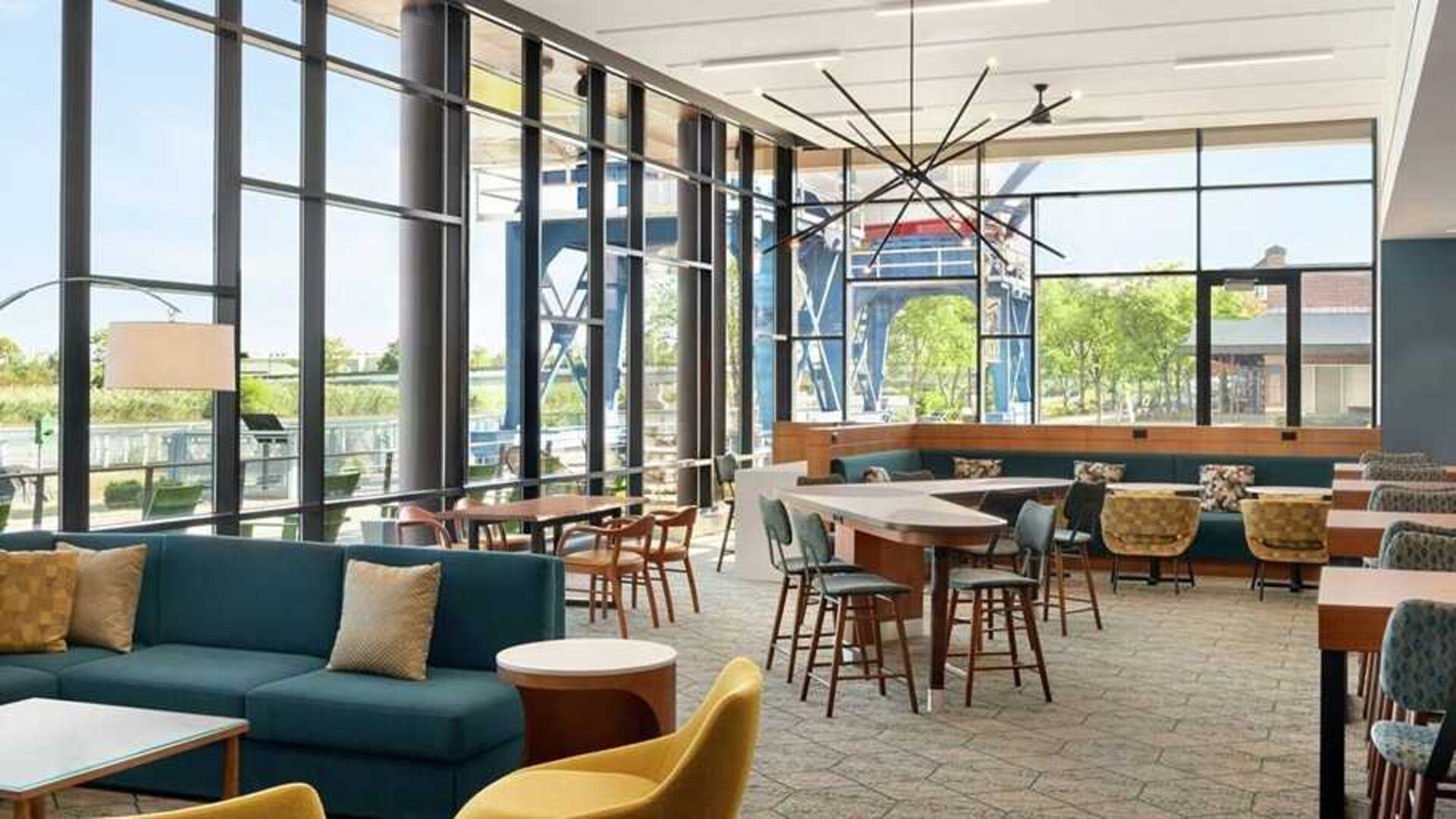 comfortable and bright-lit lounge and coworking space at Homewood Suites by Hilton Wilmington Downtown.