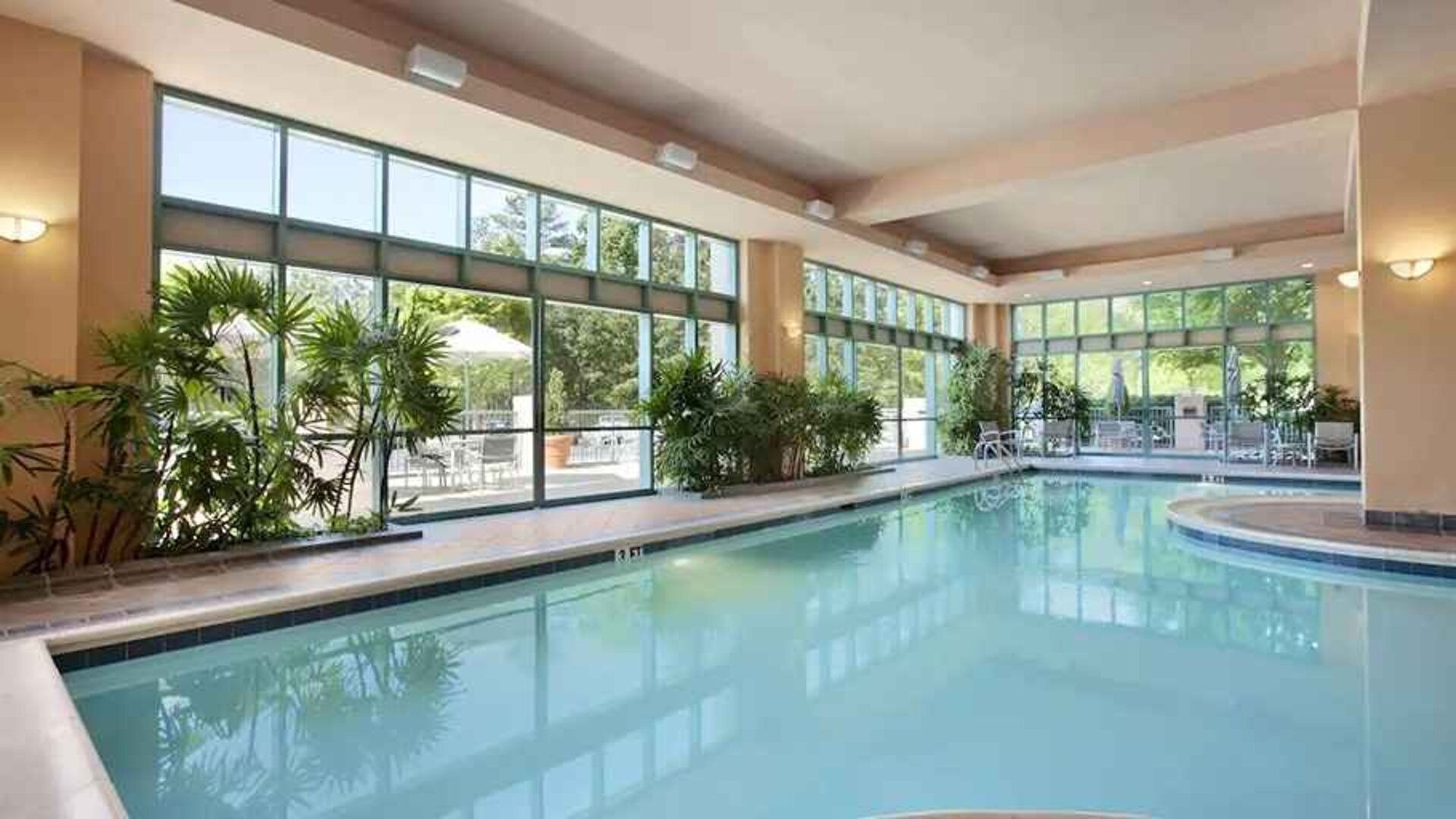 beautiful indoor pool at Embassy Suites by Hilton Raleigh Durham Research Triangle.