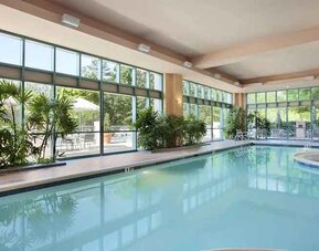 beautiful indoor pool at Embassy Suites by Hilton Raleigh Durham Research Triangle.