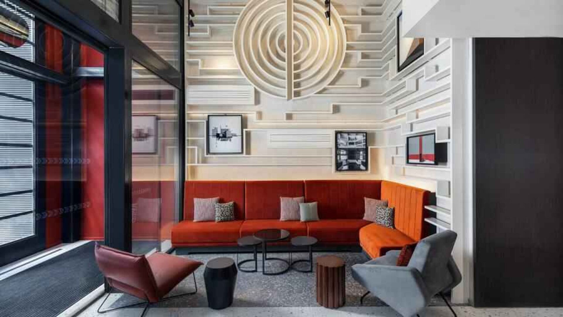 Comfortable hotel workspace with sofas at the Canopy by Hilton Paris Trocadero.