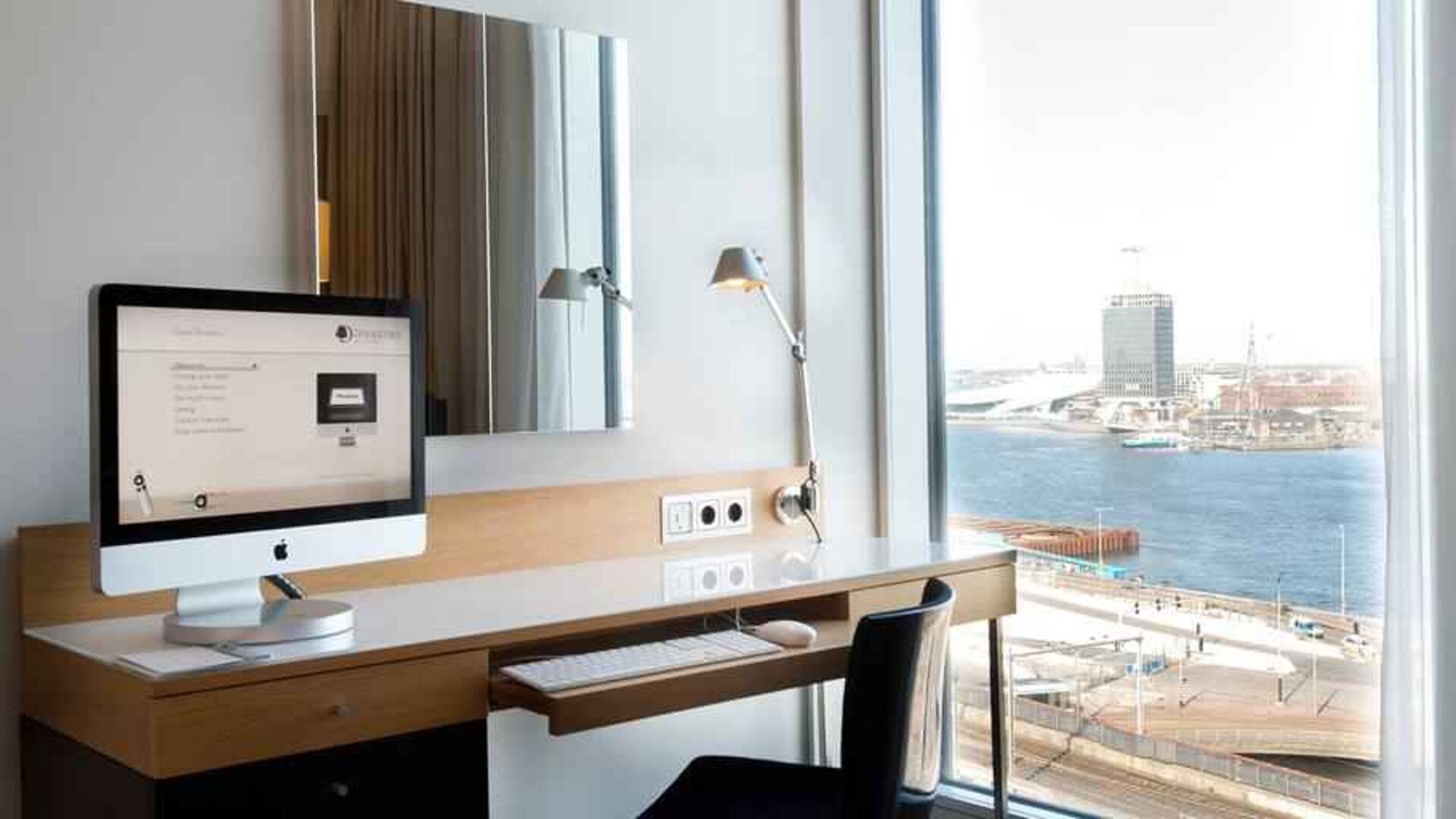 Working station overlooking the canals at the DoubleTree by Hilton Amsterdam Centraal Station.