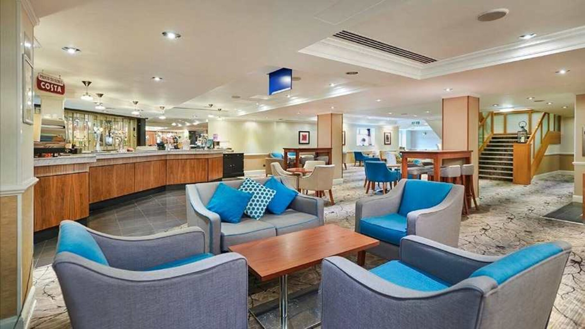 Comfortable lounge and coworking space at Hilton London Watford.