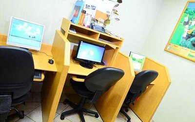 dedicated business center with PC, internet, business desk, and printer at Hampton Inn & Suites by Hilton San Jose-Airport.