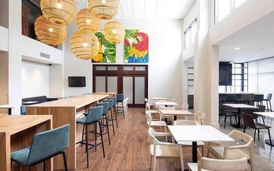 comfortable lobby and coworking space at Hampton Inn & Suites by Hilton San Jose-Airport.