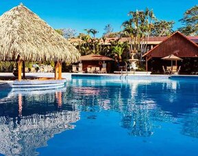 gorgeous outdoor pool with sun beds at DoubleTree by Hilton Hotel Cariari San Jose - Costa Rica.