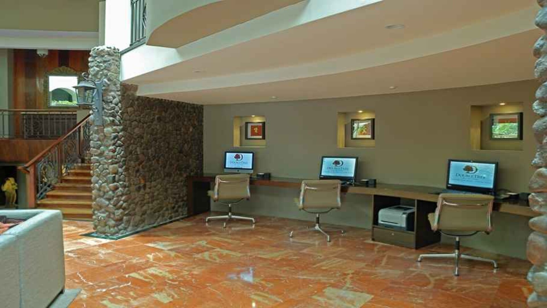 dedicated business center with PC, internet, work desk, and printer ideal for working remotely at DoubleTree by Hilton Hotel Cariari San Jose - Costa Rica.