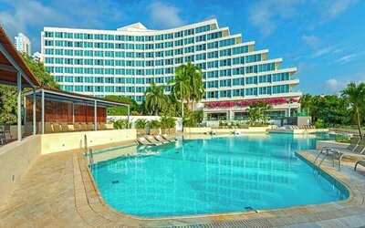 beautiful outdoor pool with sun beds at Hilton Cartagena Hotel.