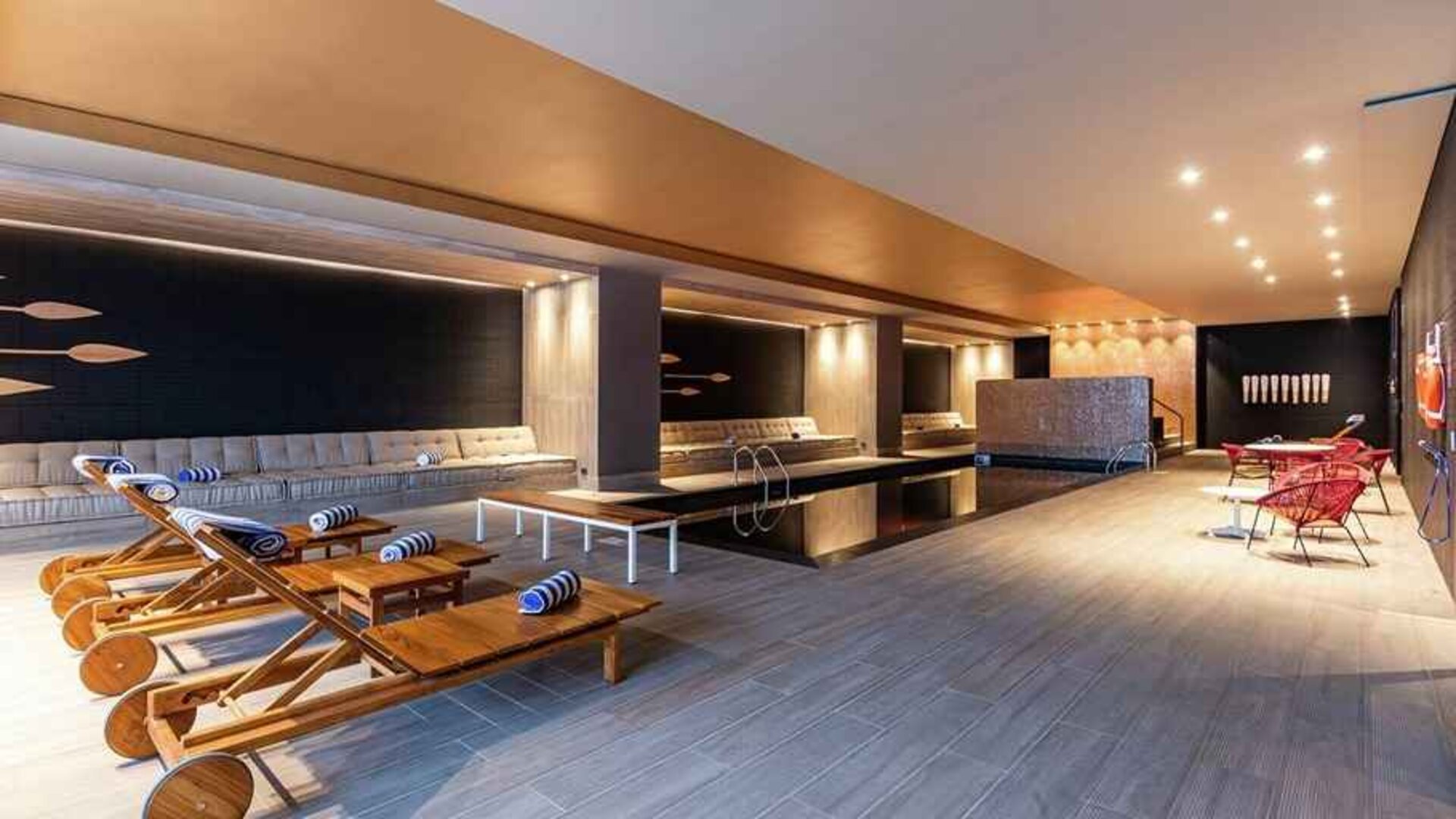 gorgeous indoor pool with sun beds at Hilton Bogota Corferias.