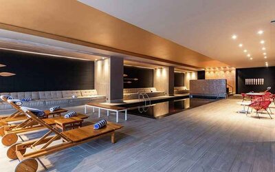 gorgeous indoor pool with sun beds at Hilton Bogota Corferias.