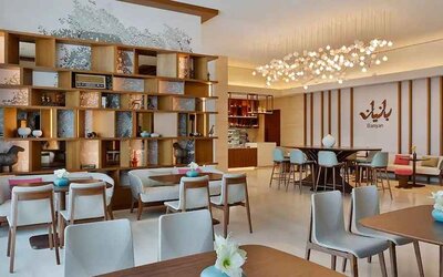 comfortable and well lit lobby and coaworking space at DoubleTree by Hilton Sharjah Waterfront Hotel & Residences.