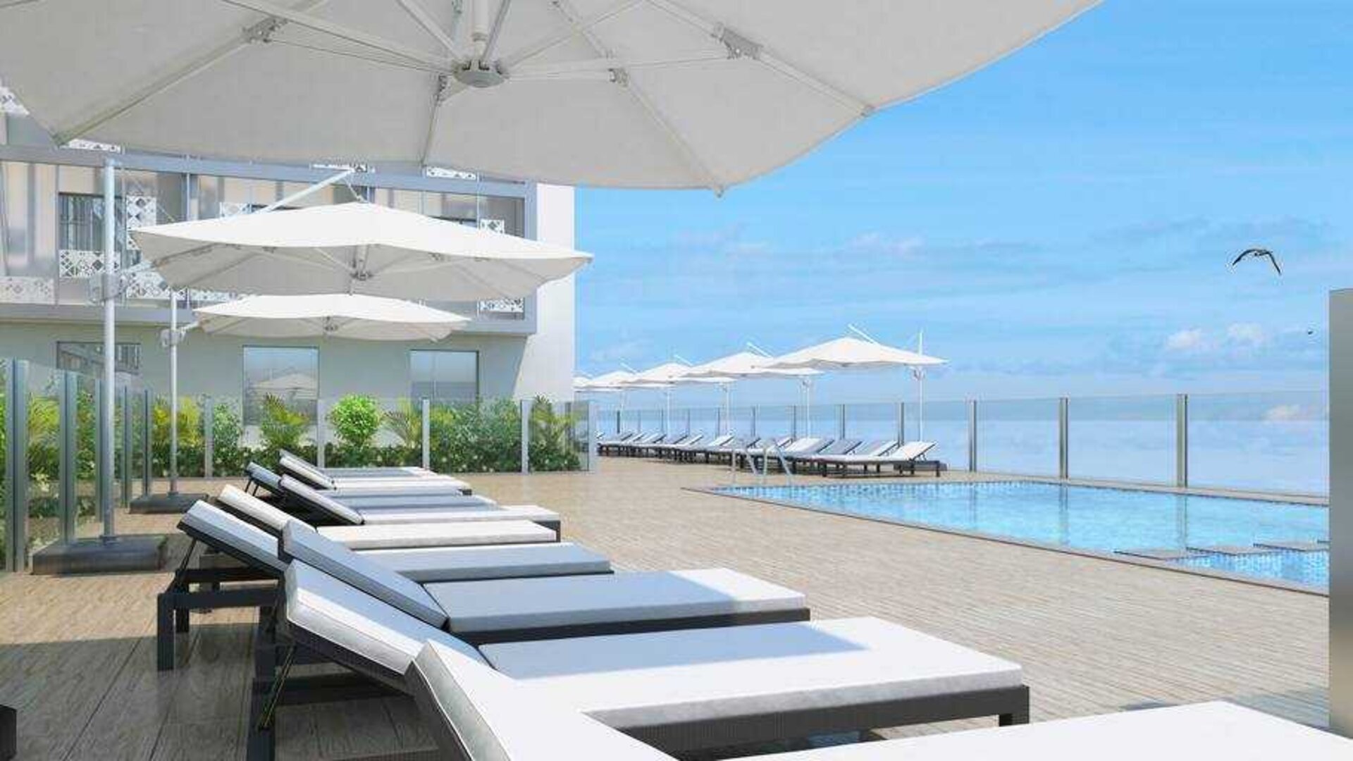 Relaxing outdoor pool area with lounges at the Hilton Garden inn Casablanca Sud.