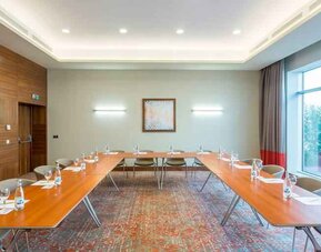 Meeting room with u shape table at the Hilton Garden Inn Tanger City Center.