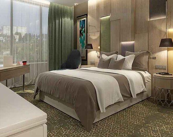 spacious king room with work desk and chair at DoubleTree by Hilton Manisa.