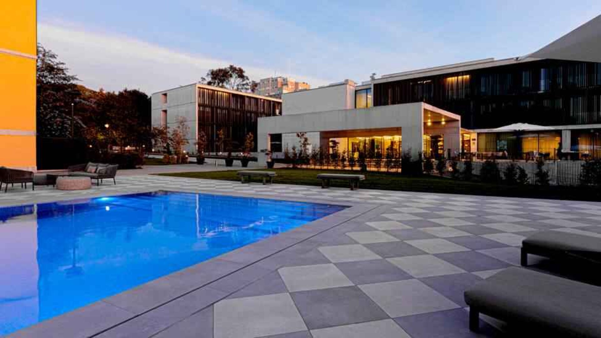 Relaxing outdoor pool at the Boeira Garden Hotel Porto Gaia, Curio Collection by Hilton.